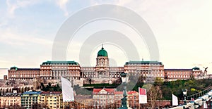 Buda Castle at sunset with warm cloudy sky