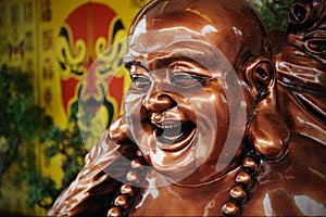 Budai or Laughing Buddha Statue photo