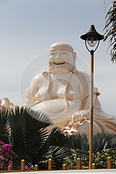 Budai statue in Vinh Trang Temple