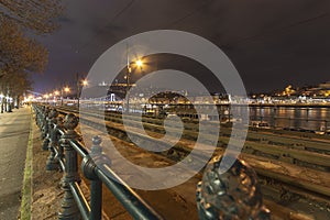 Budapest Danube riverside at night with tram tracks