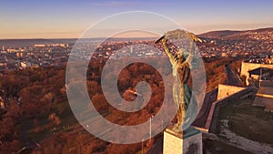 Budapest, Hungary - 4K aerial footage at sunrise of drone flying around of Statue of Liberty