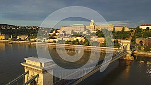 Budapest, Hungary - 4K aerial view of Szechenyi Chain Bridge at sunrise with River Danube