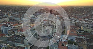 Budapest, Hungary - 4K drone flying away from St.Stephen`s Basilica at sunrise