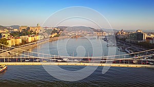 Budapest, Hungary - 4K flying over Elisabeth Bridge at sunrise towards Buda Castle Royal Palace
