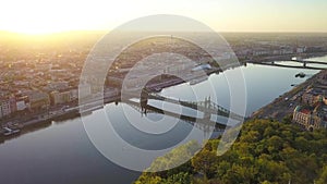 Budapest, Hungary - 4K Flying by Statue of Liberty on Gellert Hill with Liberty Bridge at background