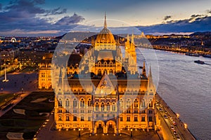 Budapest, Hungary - Aerial blue hour view of the Parliament of Hungary with Buda Castle Royal Palace, Liberty Statue