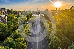 Budapest, Hungary - Aerial drone view of Andrassy street at sunrise with Heroes` Square Hosok tere at background