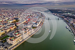 Budapest, Hungary - Aerial drone view of the beautiful Hungarian Parliament building at sunset with St. Stephen`s Basilica