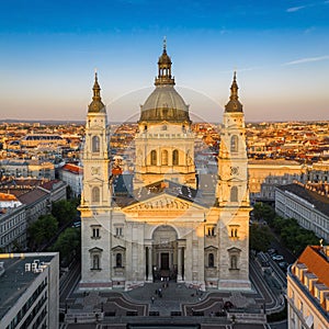 Budapest, Hungary - Aerial drone view of the beautiful St. Stephen`s Basilica at sunset with warm summer afternoon lights