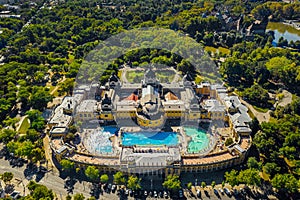 Budapest, Hungary - Aerial drone view of the famous Szechenyi Thermal Bath and Spa in City Park Varosliget