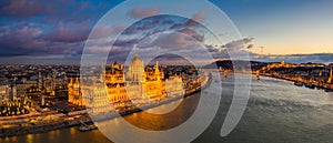 Budapest, Hungary - Aerial panoramic view of the beautiful illuminated Parliament of Hungary with Szechenyi Chain Bridge