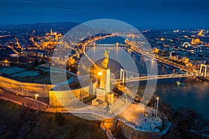 Budapest, Hungary - Aerial panoramic view of Budapest at blue hour. This view includes illuminated Statue of Liberty