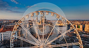 Budapest, Hungary - Aerial panoramic view of the ferris wheel at Elisabeth Square Erzsebet ter with St. Stephen`s Basilica