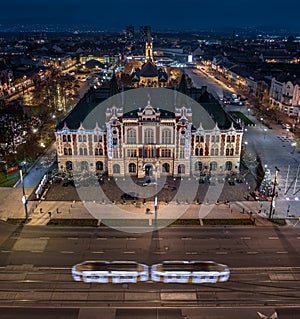 Budapest, Hungary - Aerial panoramic view of Ujpest city centre with City Hall building, St. Stephen`s square and church
