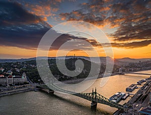 Budapest, Hungary - Aerial skyline view of a beautiful sunset over River Danube with Liberty Bridge, Gellert Hill