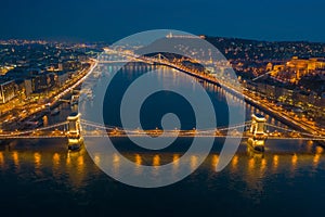 Budapest, Hungary - Aerial skyline view of Budapest at blue hour with illuminated Szechenyi Chain Bridge, Elisabeth Bridge, Citade