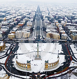 Budapest, Hungary - Aerial skyline view of snowy Budapest with Heroes ` Square, Andrassy street at winter time