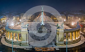 Budapest, Hungary - Aerial view of angel sculpture at Heroes` Square Hosok tere with Christmas decorated Andrassy street