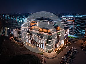 Budapest, Hungary - Aerial view of the beautiful illuminated National Theater of Hungary at dusk with clear dark blue sky