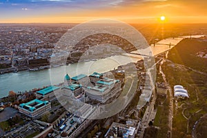 Budapest, Hungary - Aerial view of Buda Castle Royal palace at sunrise with Liberty Bridge, Elisabeth Bridge