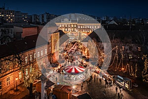 Budapest, Hungary - Aerial view of the Christmas market and carousel on Szentlelek square, Obuda at dusk