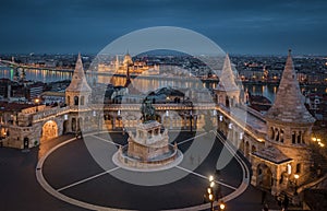 Budapest, Hungary - Aerial view of the famous Fisherman`s Bastion at dusk with Christmas festive lights