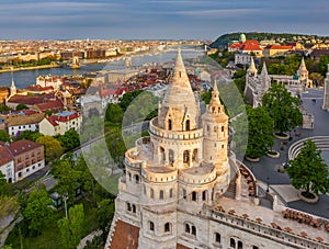 Budapest, Hungary - Aerial view of the famous Fisherman`s Bastion at sunset with Szechenyi Chain Bridge, Elisabeth Bridge