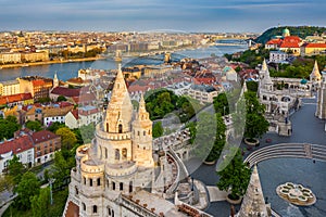 Budapest, Hungary - Aerial view of the famous Fisherman`s Bastion at sunset with Szechenyi Chain Bridge, St.Stephen`s Basilica