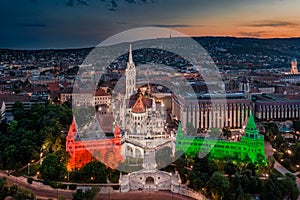 Budapest, Hungary - Aerial view the famous illuminated Fisherman`s Bastion Halaszbastya and Matthias Church in national colors