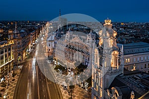 Budapest, Hungary - Aerial view of Ferenciek tere Square of the Franciscans at dusk with illuminated Matild Palace photo