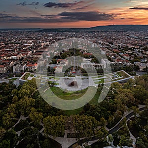 Budapest, Hungary - Aerial view of the Museum of Ethnography at City Park with skyline of Budapest at background at sunset