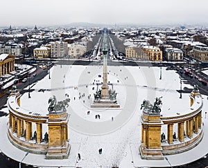 Budapest, Hungary - Aerial view of snowy Heroes ` Square Hosok tere with Andrassy and Dozsa Gyorgy street photo