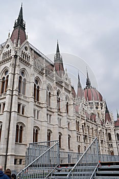 Budapest, Hungary - April 29, 2023 - the majestic facade of the Hungarian Parliament building, built in the neo-Gothic style.