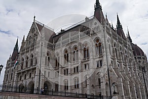 Budapest, Hungary - April 29, 2023 - the majestic facade of the Hungarian Parliament building, built in the neo-Gothic style.