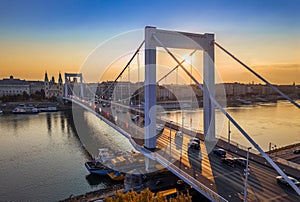 Budapest, Hungary - Beautiful Elisabeth Bridge Erzsebet hid at sunrise with golden and blue sky, heavy morning traffic