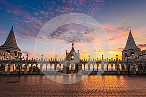 Budapest, Hungary - Beautiful golden sunrise at Fisherman`s Bastion Halaszbastya with Parliament of Hungary