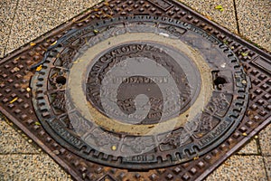 Budapest, Hungary: Beautiful hatch with ornament and decor, manhole cover on the road in city center on Budapest