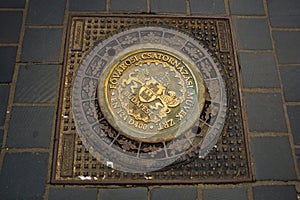 Budapest, Hungary: Beautiful hatch with ornament and decor, manhole cover on the road in city center on Budapest