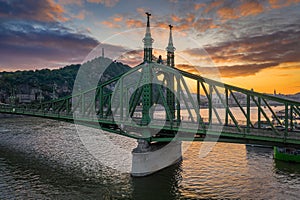 Budapest, Hungary - Beautiful sunset over River Danube with Liberty Bridge, Gellert Hill and Statue of Liberty