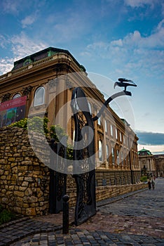 BUDAPEST, HUNGARY: Corvin Gate on St. George Square of Royal Palace of Budapest,with big black raven on top, symbolizing of King