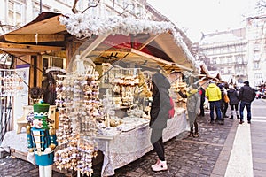 BUDAPEST, HUNGARY - DECEMBER 19, 2018: Tourists and local people enjoying the beautiful Christmas Market at St. Stephen's Square