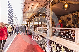 BUDAPEST, HUNGARY - DECEMBER 19, 2018: Tourists and local people enjoying the beautiful Christmas Market at St. Stephen's Square