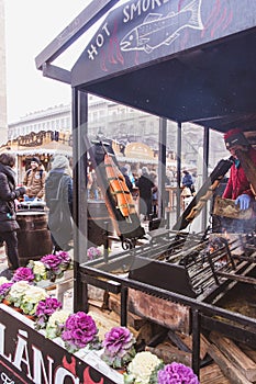 BUDAPEST, HUNGARY - DECEMBER 19, 2018: Tourists and local people enjoying the beautiful Christmas Market at St. Stephen