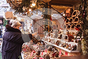 BUDAPEST, HUNGARY - DECEMBER 19, 2018: Tourists and local people enjoying the beautiful Christmas Market at St. Stephen