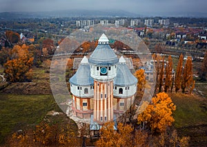 Budapest, Hungary - Drone view of the old, unused tar-towers of the Obuda Gas factory, taken from above on a foggy autumn day