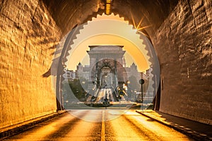 Budapest, Hungary - Entrance of the Buda Castle Tunnel at sunrise with empty Szechenyi Chain Bridge