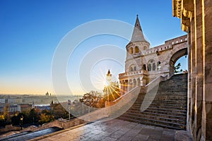 Budapest, Hungary - Entrance steps and the south tower of the Fisherman`s Bastion Halaszbastya at sunrise