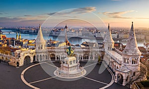 Budapest, Hungary - The famous Fisherman`s Bastion at sunrise with statue of King Stephen I and Parliament