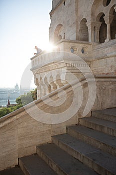 Budapest, Hungary - The famous Fisherman`s Bastion at sunrise with statue of King Stephen I and Parliament of Hungary at