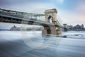 Budapest, Hungary - The famous Szechenyi Chain Bridge on the icy River Danube